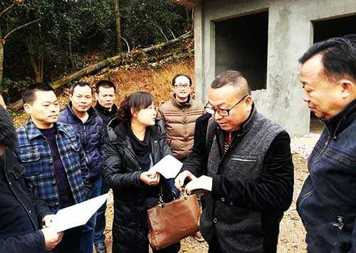 市书店相关部门来慈利抽验危房改造工作